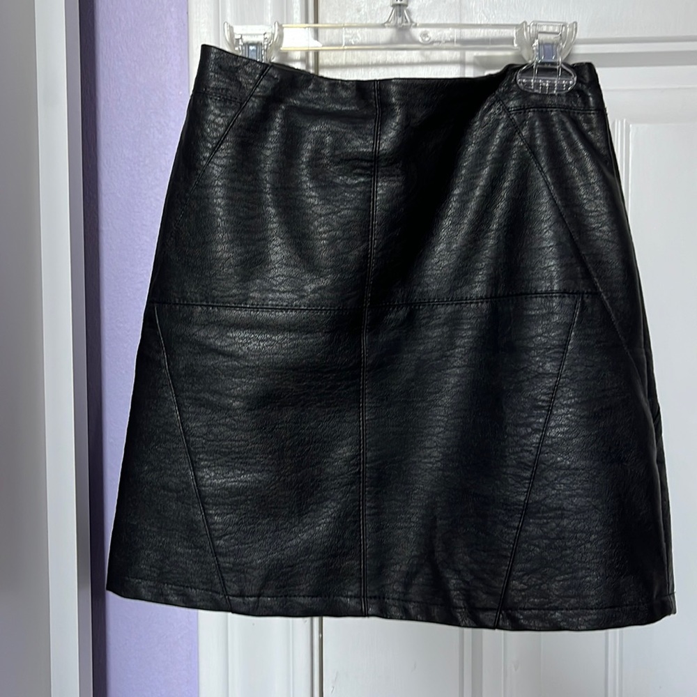 Divided black leather mini skirt